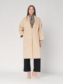 Cappotto con un bottone