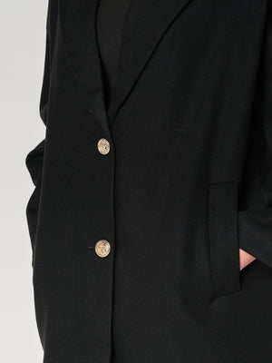 Cappotto con un bottone