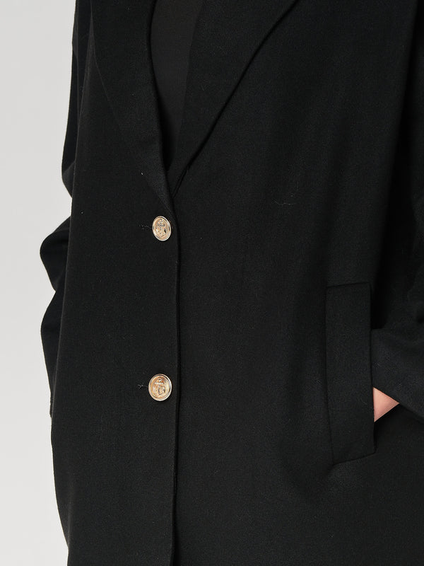 Cappotto con un bottone