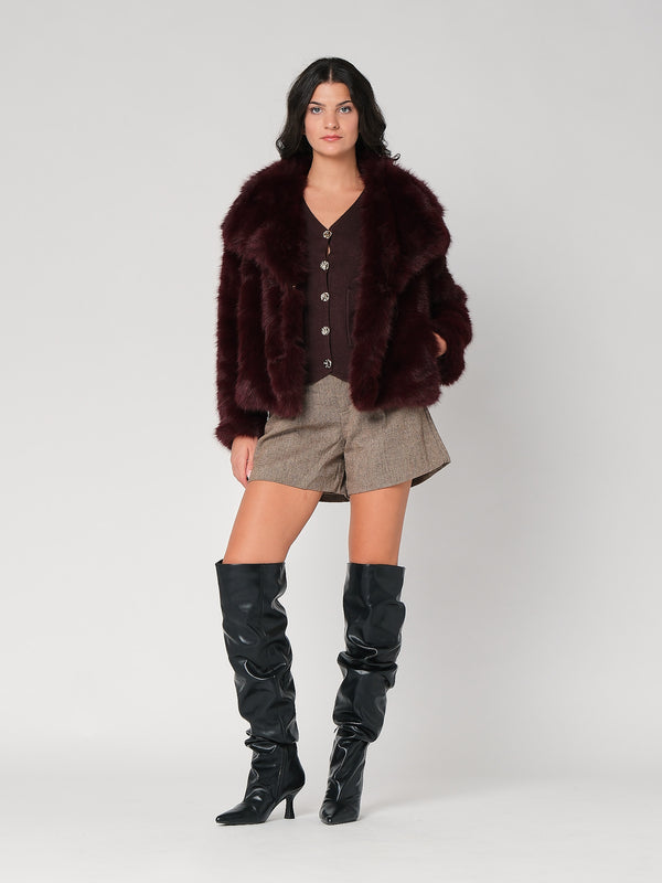 Gilet con bottoni e due tasche