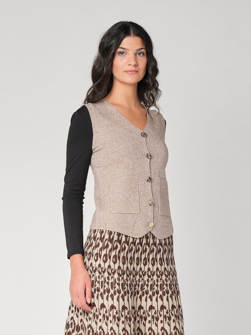 Gilet con bottoni e due tasche
