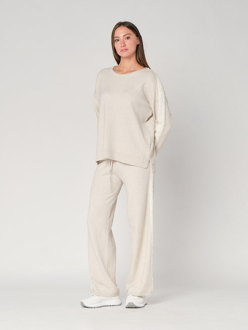 Komplett mit Pailletten