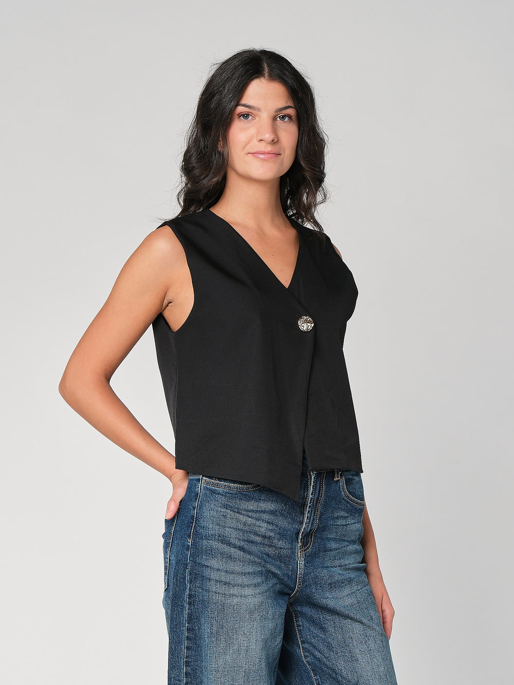 Gilet con bottone oro