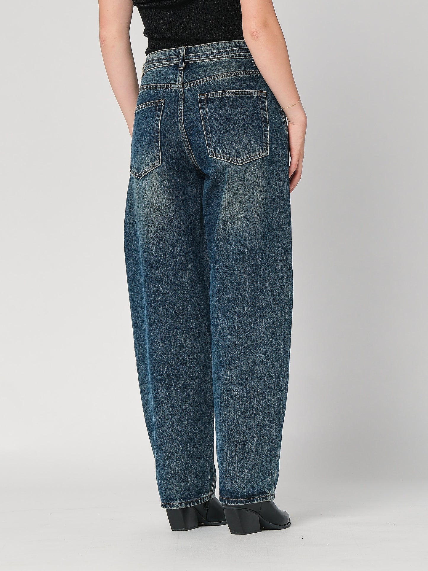 Jeans gamba larga con cintura