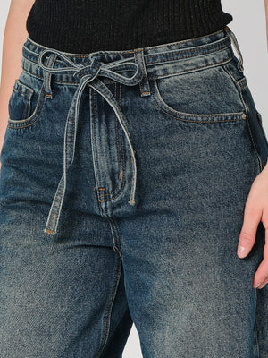 Jeans gamba larga con cintura