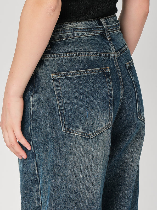 Jeans gamba larga con cintura