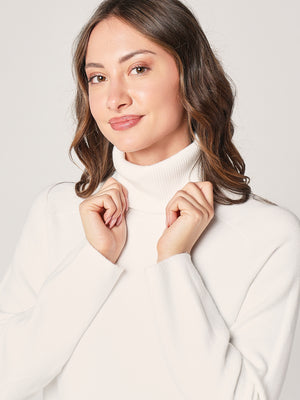 Maglia lunga con spacco davant