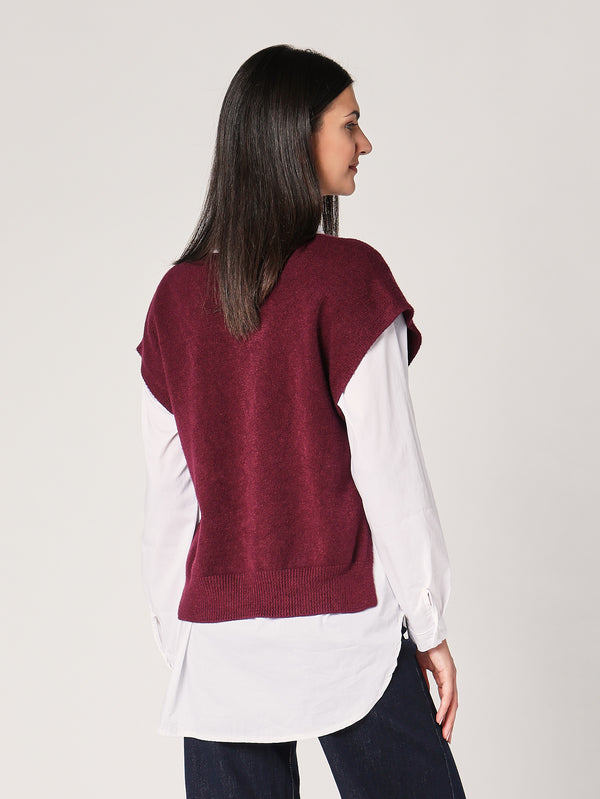 Gilet con bottoni a lato
