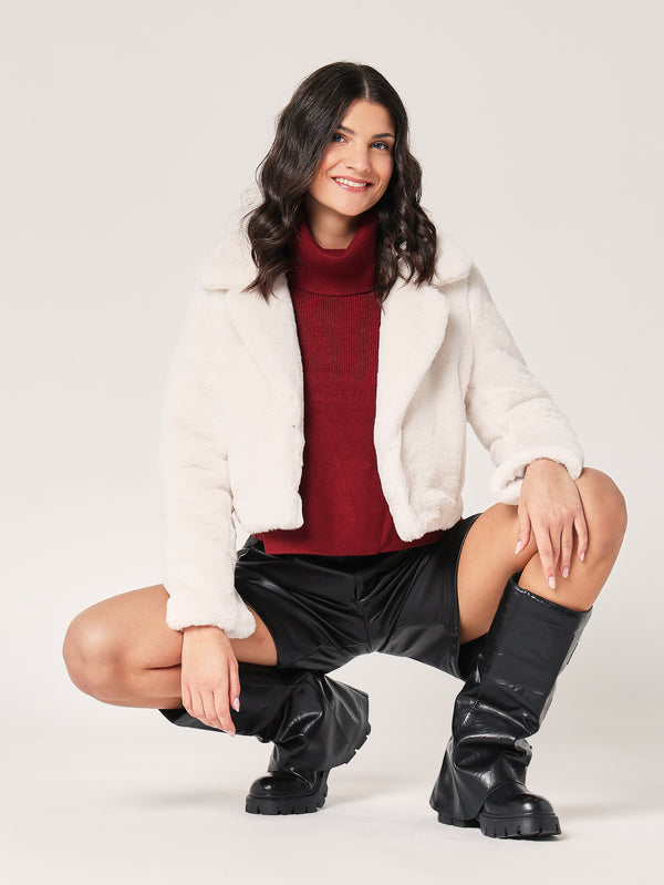 Rollkragenpullover mit Manschettenknöpfen