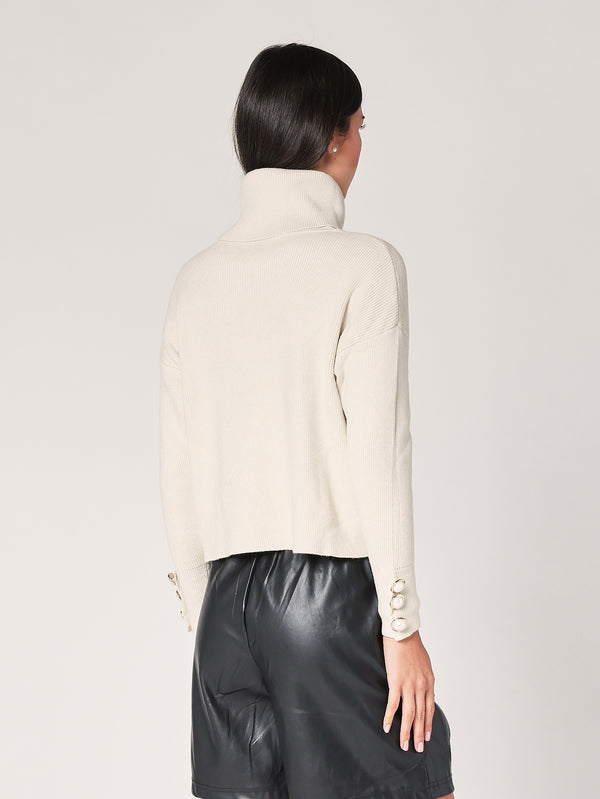 Rollkragenpullover mit Manschettenknöpfen 