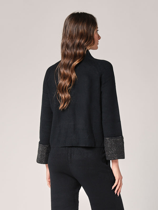 Komplett mit Lurex am Handgelenk