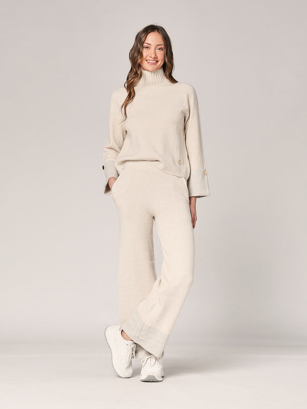 Komplett mit Lurex am Handgelenk