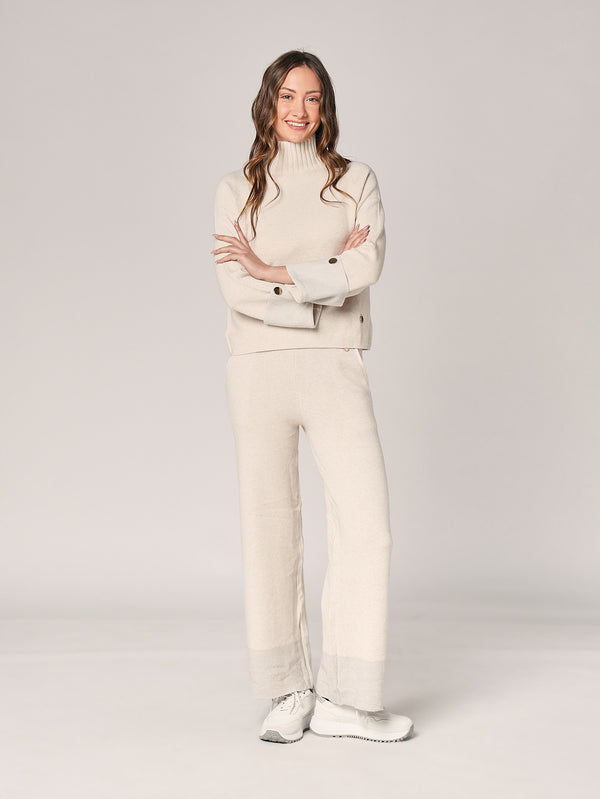 Komplett mit Lurex am Handgelenk