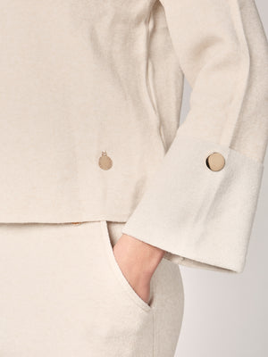 Komplett mit Lurex am Handgelenk