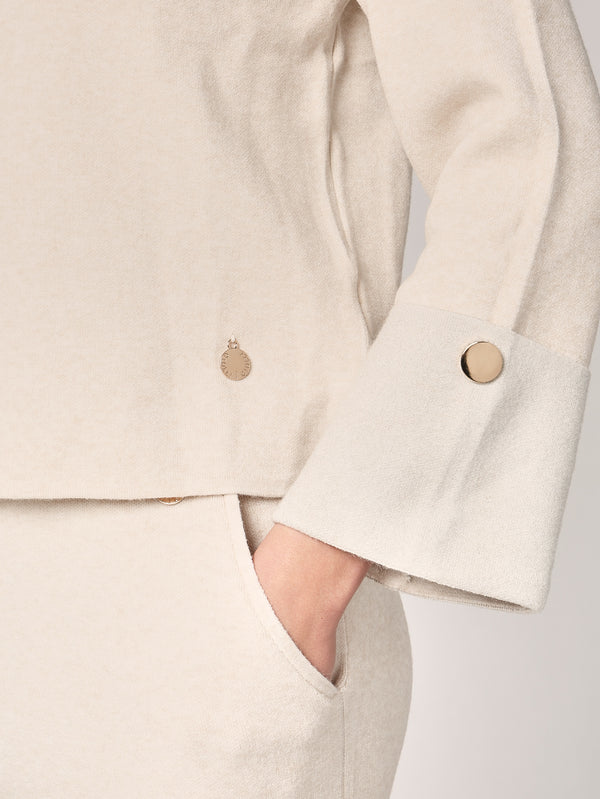 Komplett mit Lurex am Handgelenk