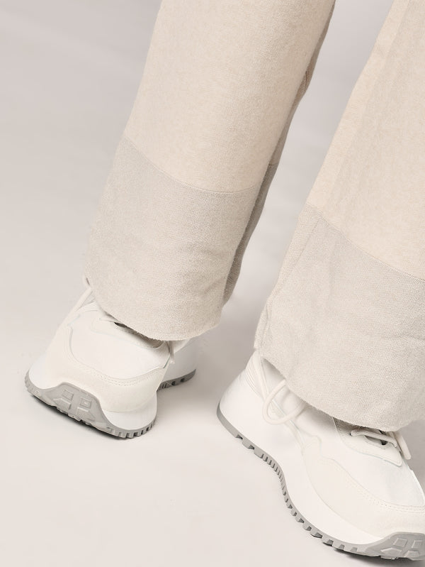 Komplett mit Lurex am Handgelenk