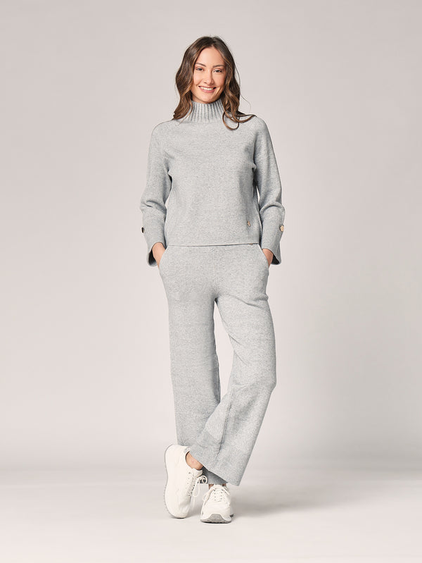 Komplett mit Lurex am Handgelenk