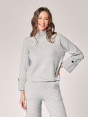 Komplett mit Lurex am Handgelenk