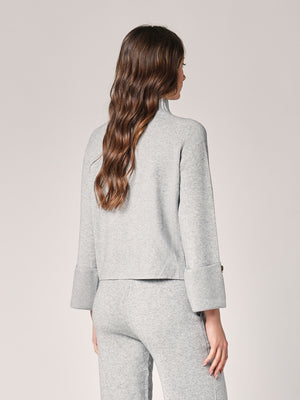 Komplett mit Lurex am Handgelenk