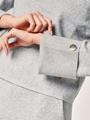 Komplett mit Lurex am Handgelenk