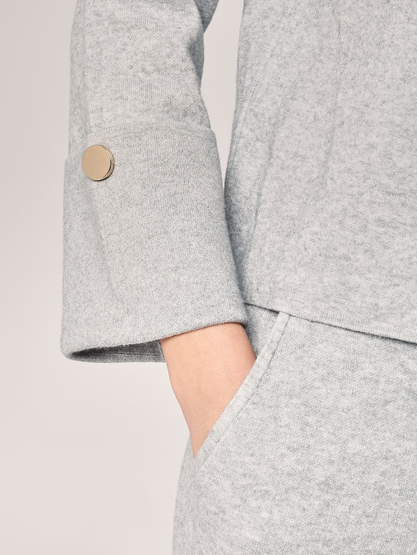 Komplett mit Lurex am Handgelenk