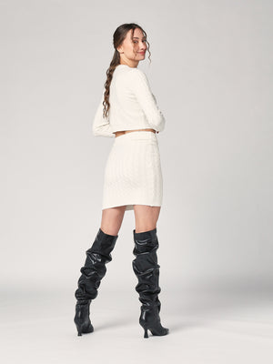 Completo golfino e gonna trecce