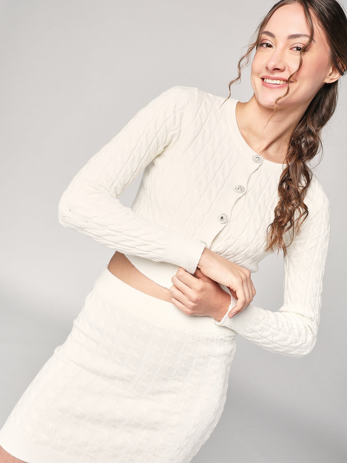 Completo golfino e gonna trecce