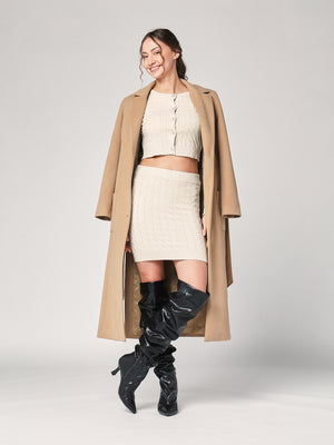 Completo golfino e gonna trecce