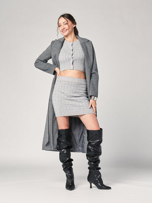 Completo golfino e gonna trecce