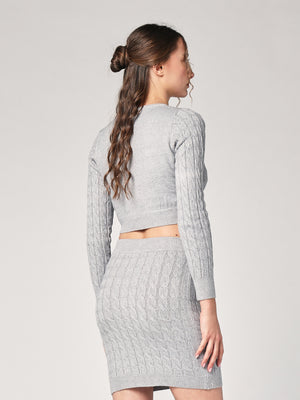 Completo golfino e gonna trecce