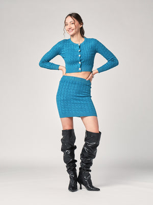 Completo golfino e gonna trecce