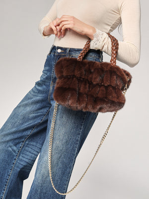 Borsa pelliccia mani trecce