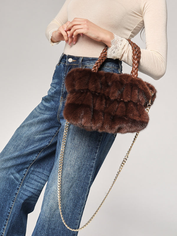 Borsa pelliccia mani trecce