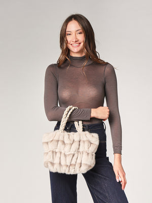 Borsa pelliccia mani trecce