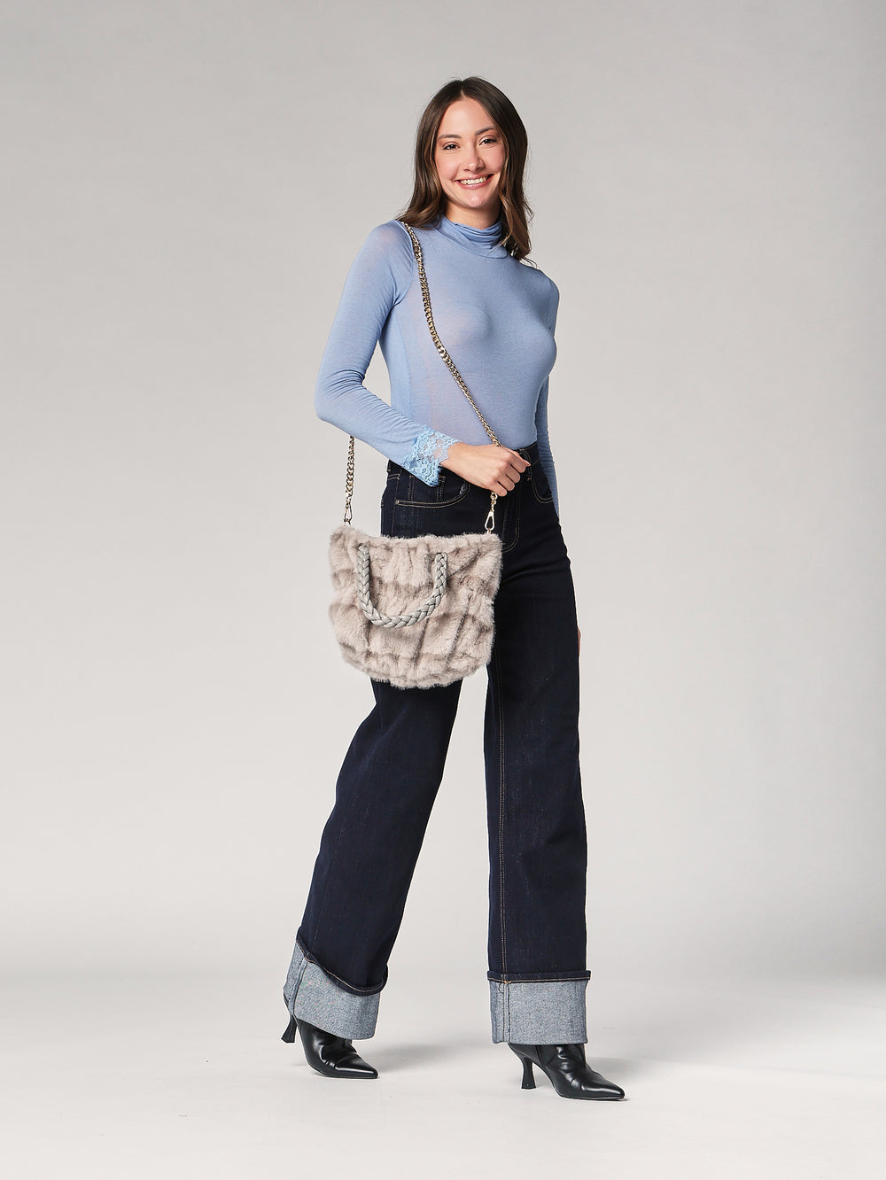 Borsa pelliccia mani trecce