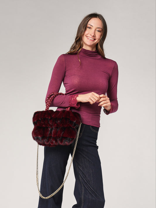 Borsa pelliccia mani trecce