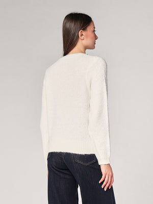 Maglia con paillettes e applicazioni