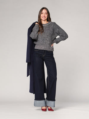 Maglia con paillettes e applicazioni