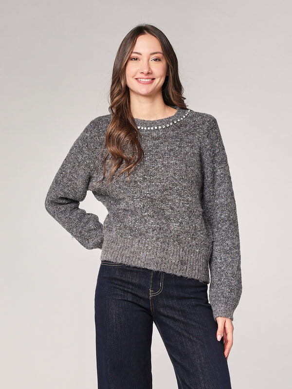 Maglia con paillettes e applicazioni