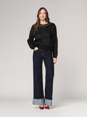 Maglia con paillettes e applicazioni