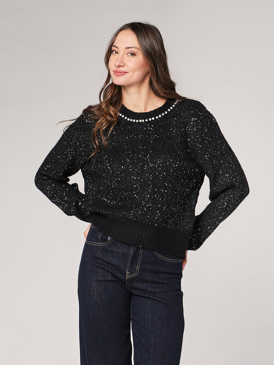 Maglia con paillettes e applicazioni