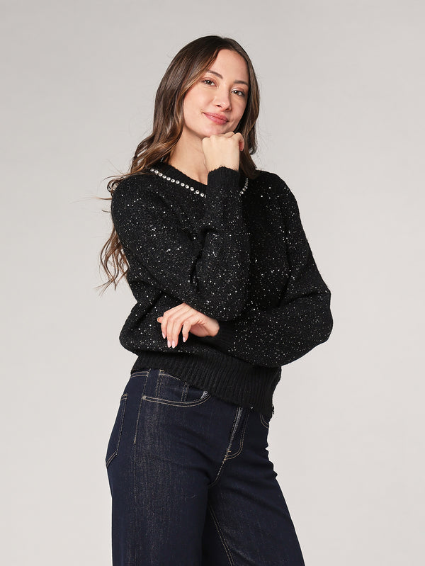 Maglia con paillettes e applicazioni