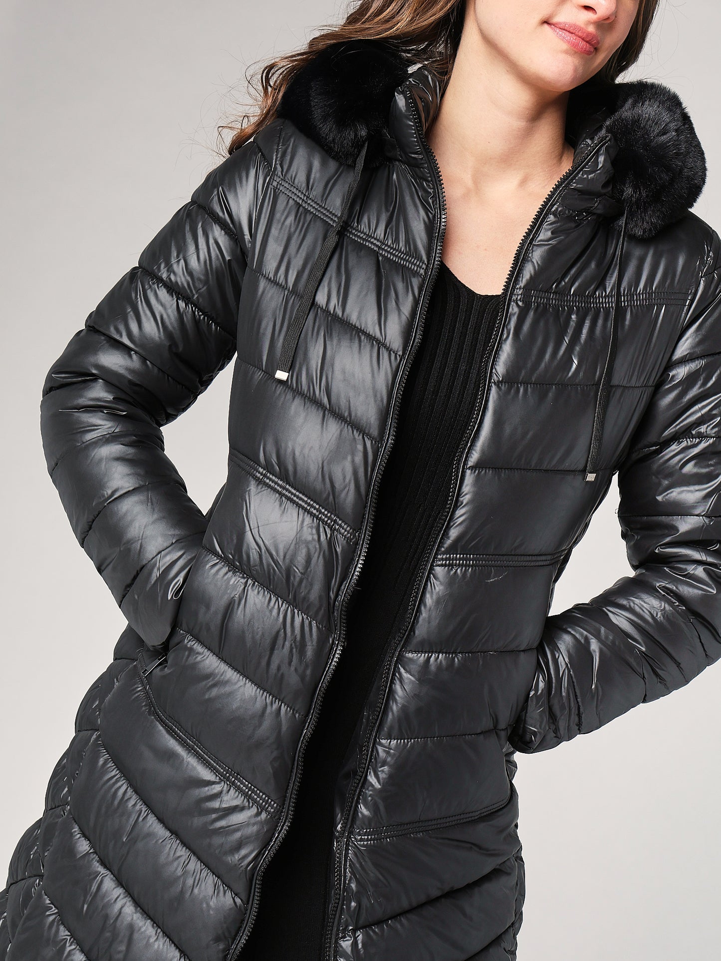 Piumino con cappuccio