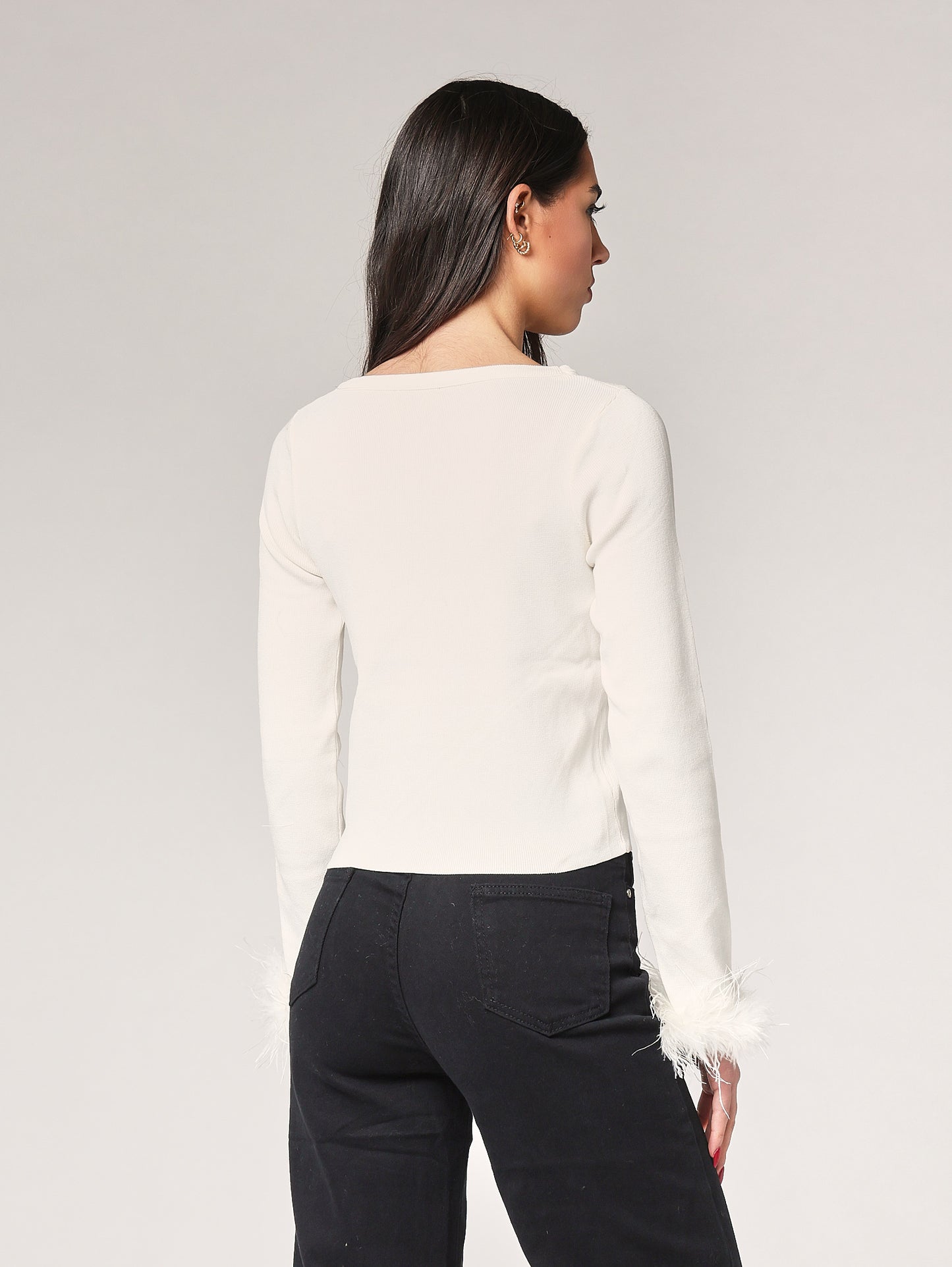 Maglia con polso a piume