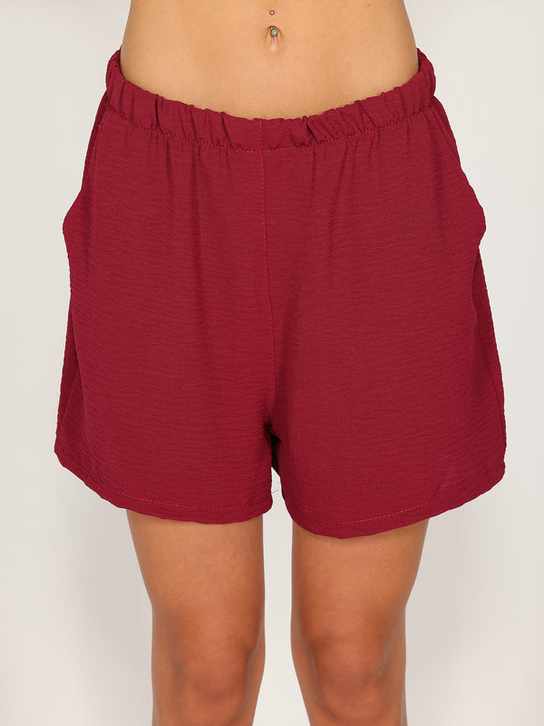 Completo top e shorts