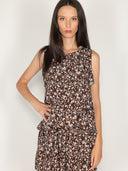 Top fantasia floreale con balze