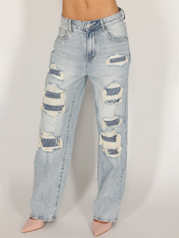 Jeans strap e strass