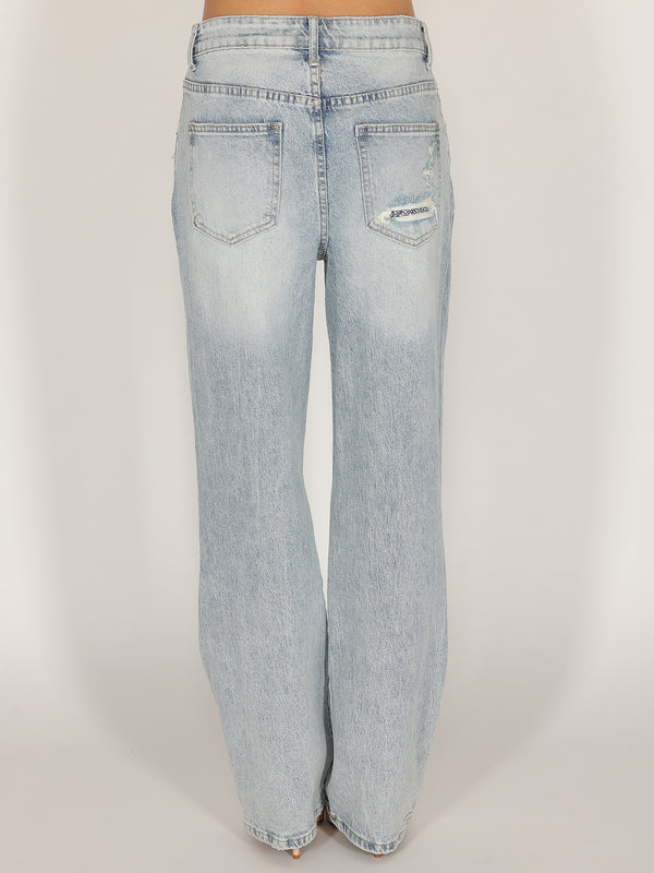 Jeans strap e strass