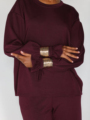 Completo con accessorio oro