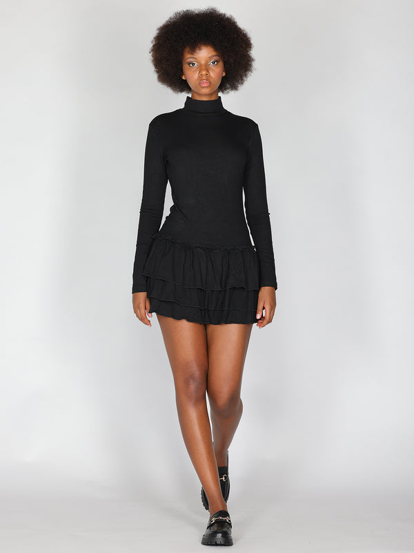 Abito maglia con gonna a balze